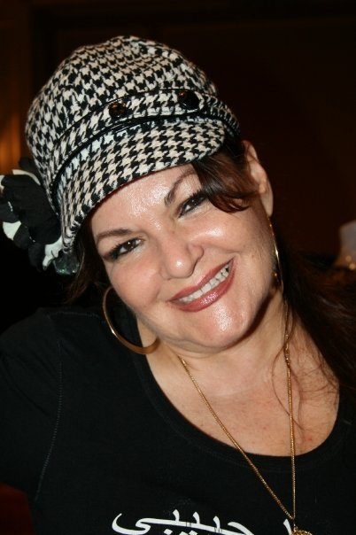 Portrait of Jihan Jamal in a houndstooth cap, 2009
