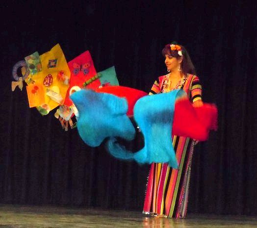 Bellyrina Oriental Dance Theatre member Carolina Morales with fan veils